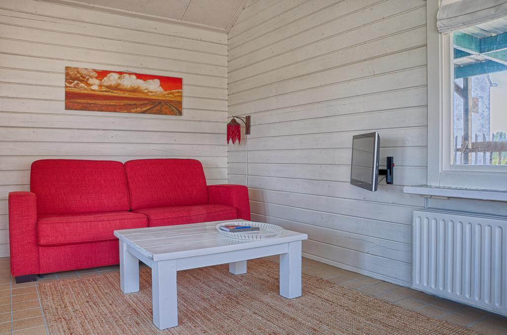Artistiek Vakantiehuisje Хулст Стая снимка